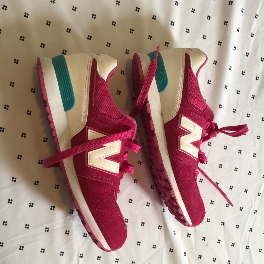 New Balance sneakers.  Hot pink